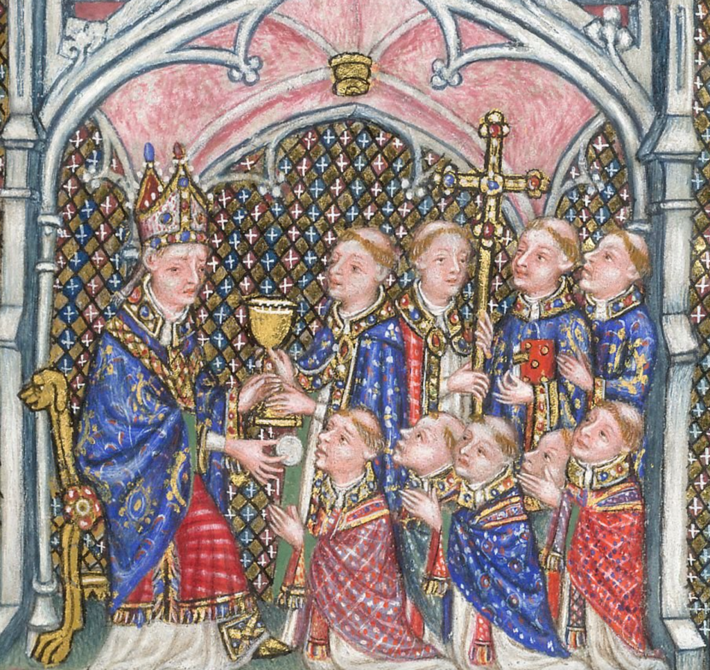 Medieval manuscript image of a bishop administering a communion wafer to the first of five newly ordained priests who kneel before him; behind, a chaplain holds a cup, with a cross-bearer and two deacons.
