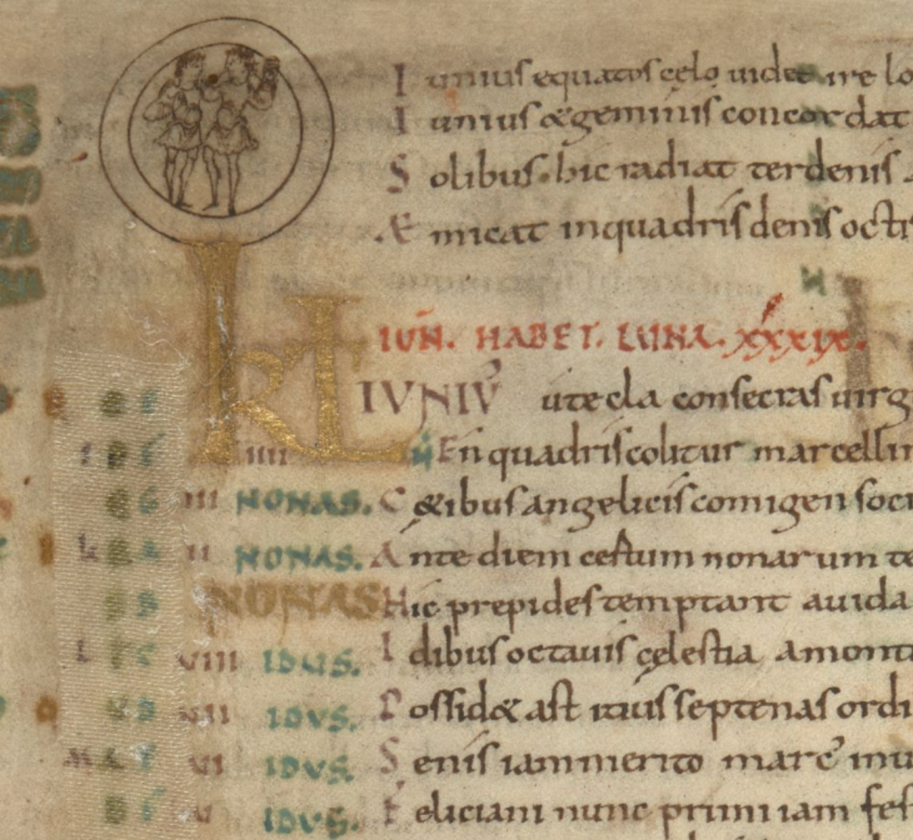 Crop of a medieval manuscript with writing in Latin in black, red and green ink, with decorative initials in gold; in the top right corner are two people standing inside a double ring, representative of Gemini.