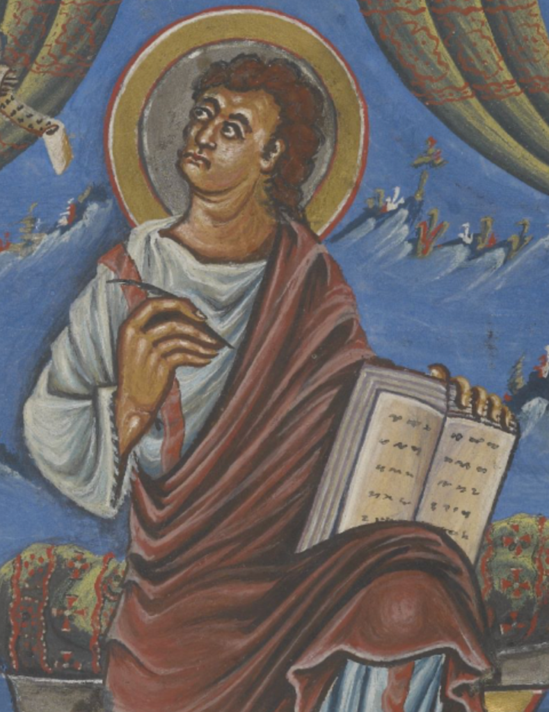 Medieval manuscript image of a haloed man sitting and looking off to his left, holding a pen in his right hand and an open book in his left hand.